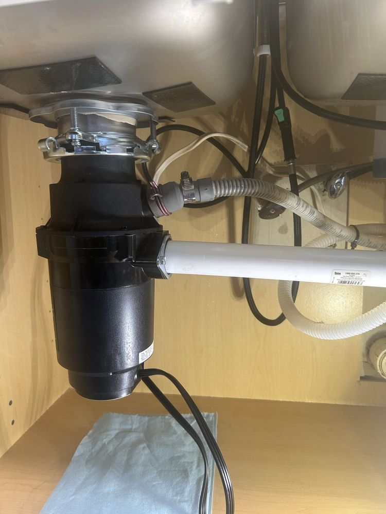 Garbage disposal replacement under kitchen sink